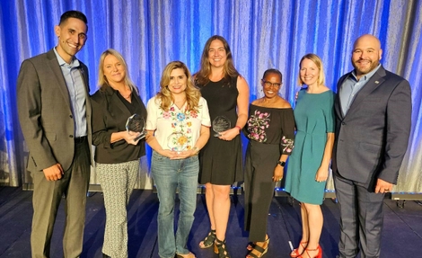 Jeremiah Aja and Marlon Morgan (CEO) of Wellness Together, Paula Ambrose and Amanda Lasik of Blue Shield of California, and Mental Health Innovator Award recipients at the Wellness Together Conference Wellness Together group